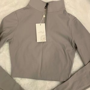 balance athletica element osmium refine crop zip